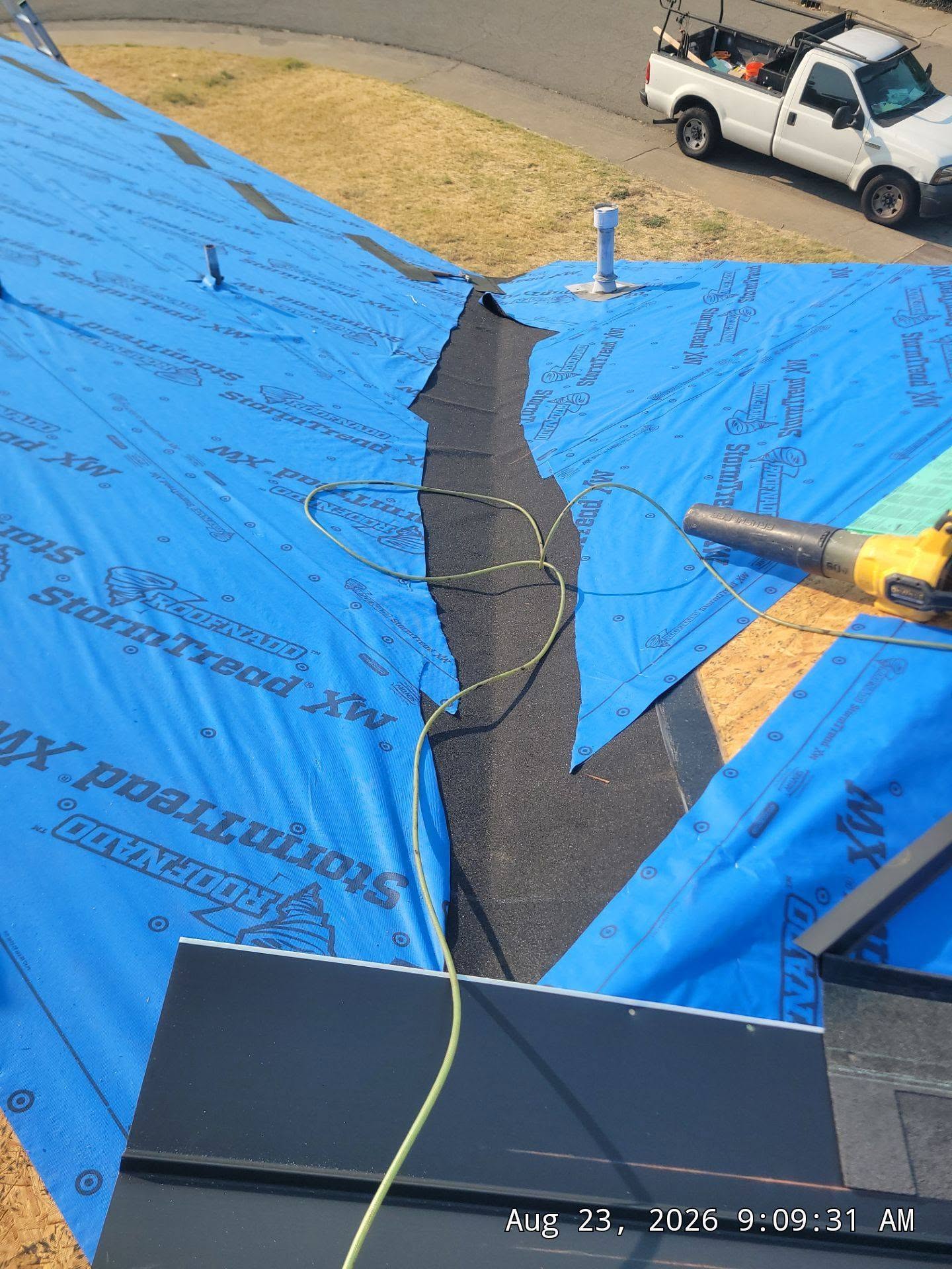Underlayment installed over new roof decking