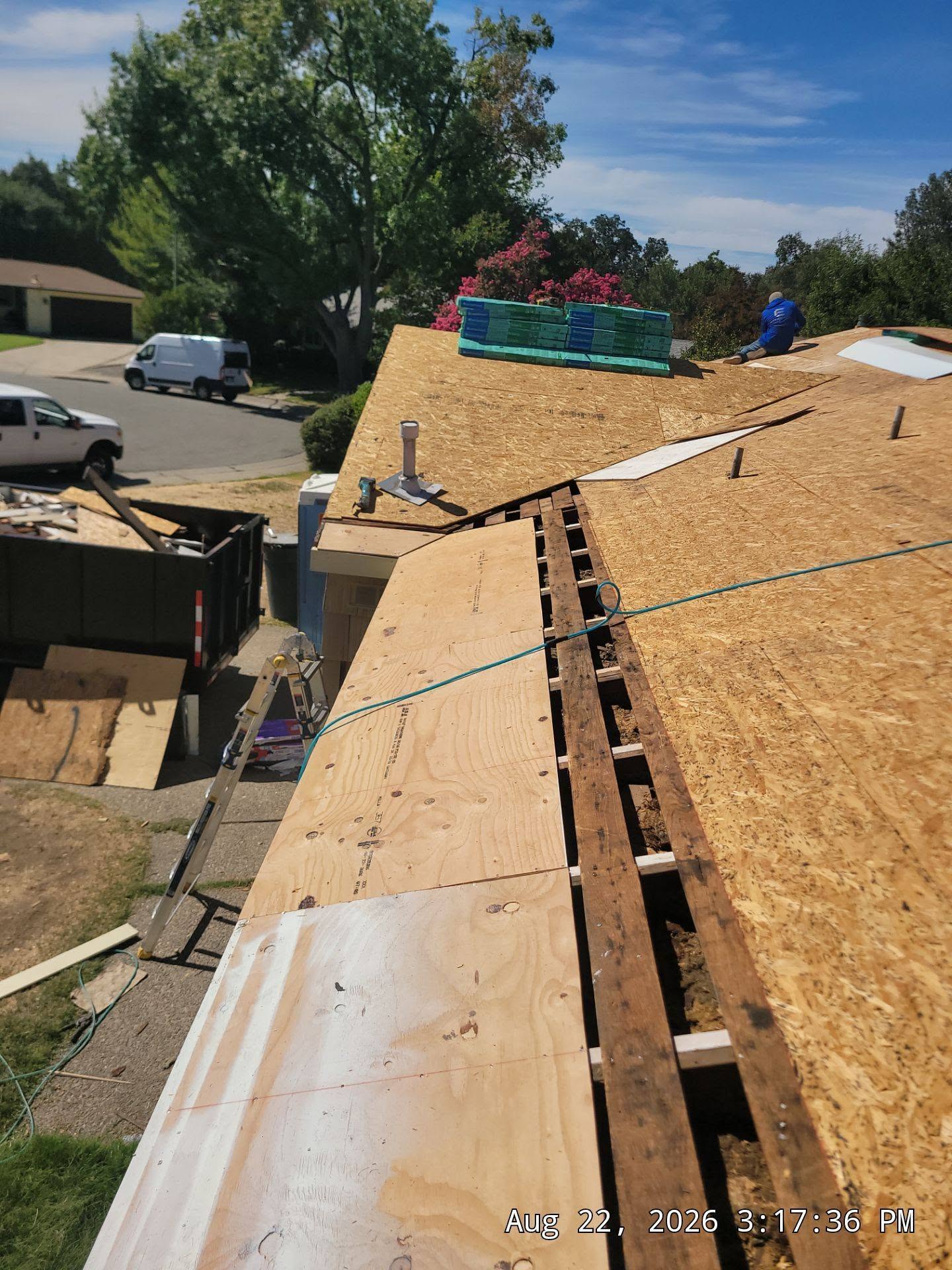 Roof decking being prepared for new roofing